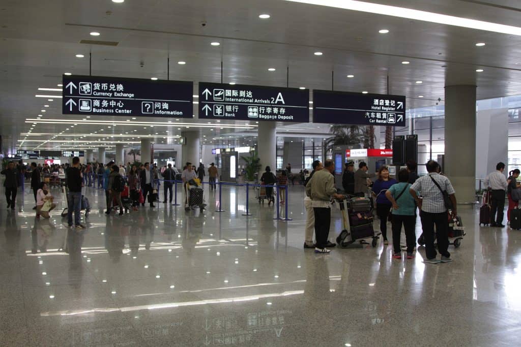 Upon landing at Shanghai Pudong Airport, you'll find dedicated counters and kiosks strategically located within the arrival halls of both terminals.
